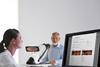 iCare_ILLUME_doctor_looking_at_screen_and_patient