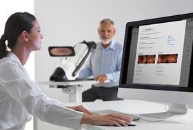 56887_icare_illume_doctor_looking_at_screen_and_patient_600582_crop